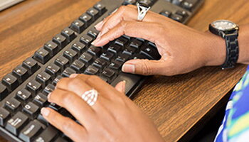 Student using a keyboard.