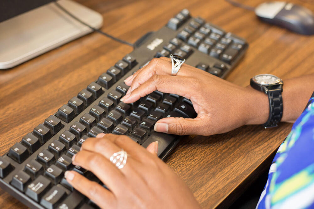 Student using a keyboard.